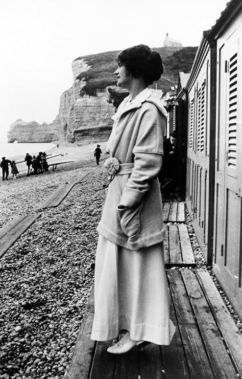 Gabrielle Coco Chanel N(1883-1971) French Fashion Designer Photographed On The Beach In Etretat Normandy Early 20Th Century In The Background Is The