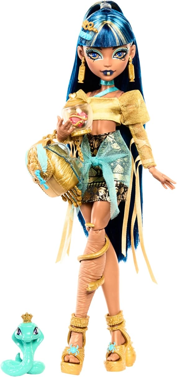 Monster High Cleo De Nile doll in gold blouse and multi-layer skirt contains pet cobra hissette and accessories such as backpack snack and paper roll HXH74